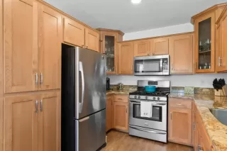 Browse active condo listings in HILLTOP VILLAGE