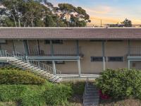 Browse active condo listings in PACIFIC WOODLANDS